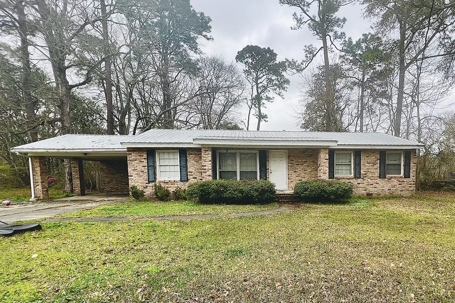 Before renovation — Saraland home